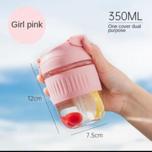 Glass coffee cup in girl pink colour held in hand