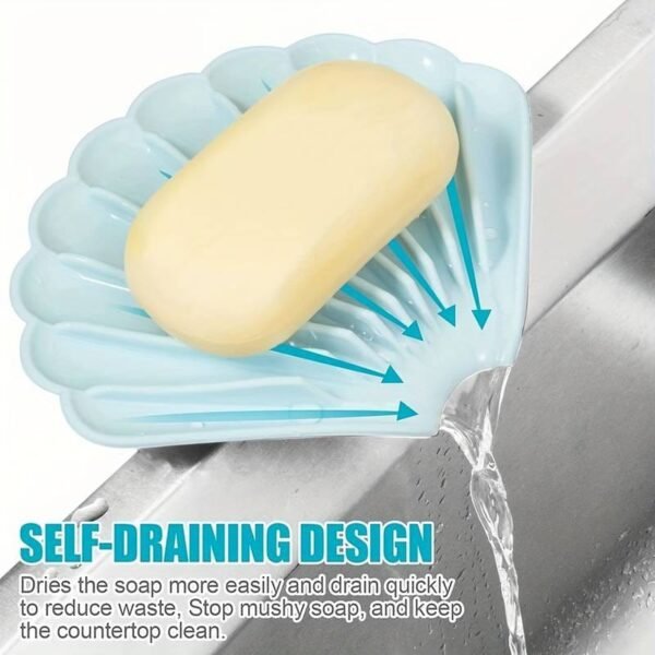 Sea shell silicone soap dish in blue with soap and self draining design