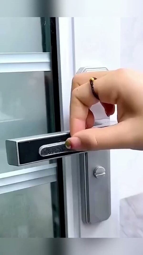 Clear sealing strip being applied on a door handle edge