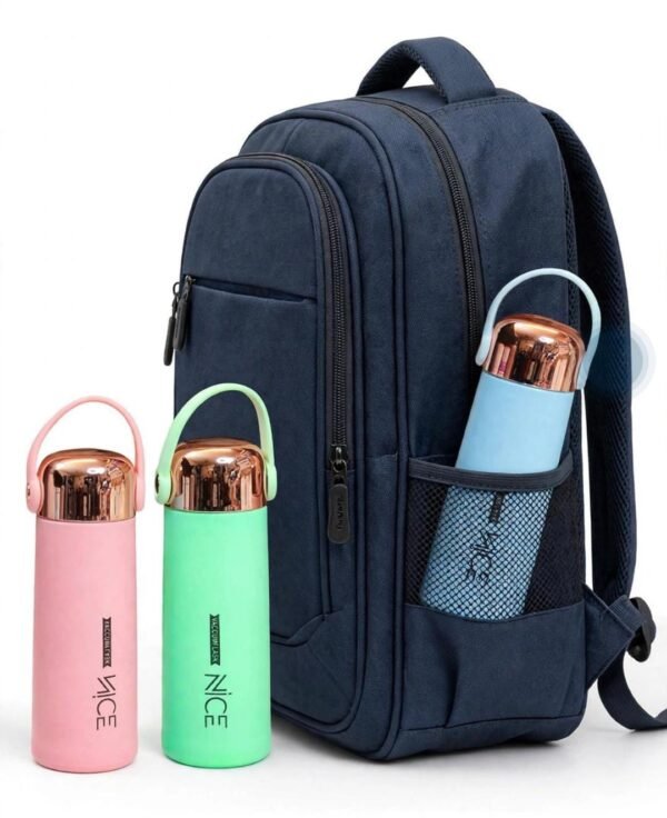 Insulated flask bottles next to a backpack for travel