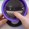 Mini turbo fan being adjusted by hand