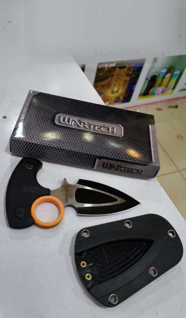 Push knife blade and secure sheath laid out with the box