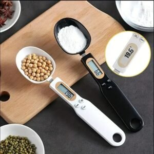 Digital measuring spoon scale weighing cocoa powder on the LCD display