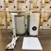 Rechargeable portable milk warmer with digital display, USB cable and insulating sleeves